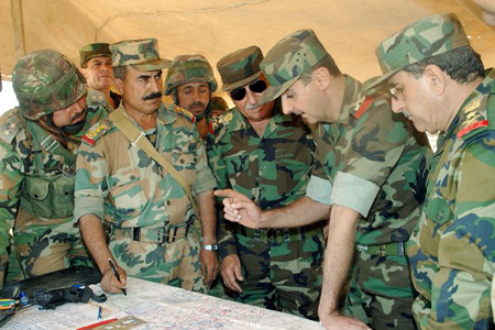 عکس کمتر دیه شده از "بشار اسد" رئیس جمهوری سوریه با لباس نظامی