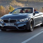 2015 BMW M4 convertible front side motion view 21