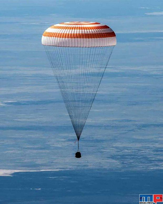 تصاویری دیدنی از لحظه فرود فضانوردان روی زمین 8 لحظه فرود فضانوردان روی زمین