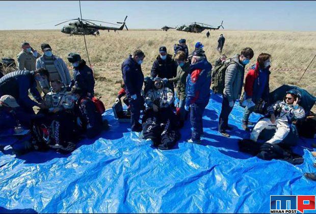 تصاویری دیدنی از لحظه فرود فضانوردان روی زمین 9 لحظه فرود فضانوردان روی زمین